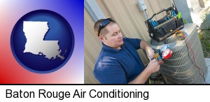Baton Rouge, Louisiana - an HVAC contractor servicing an air conditioner