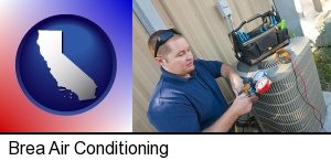 an HVAC contractor servicing an air conditioner in Brea, CA