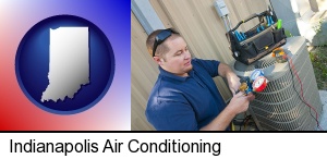 Indianapolis, Indiana - an HVAC contractor servicing an air conditioner