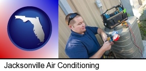 Jacksonville, Florida - an HVAC contractor servicing an air conditioner