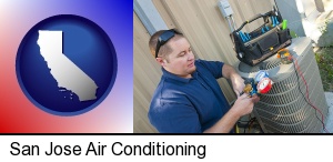 San Jose, California - an HVAC contractor servicing an air conditioner