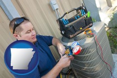 arkansas an HVAC contractor servicing an air conditioner