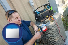 colorado an HVAC contractor servicing an air conditioner