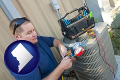washington-dc an HVAC contractor servicing an air conditioner