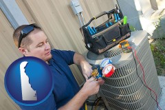 delaware an HVAC contractor servicing an air conditioner