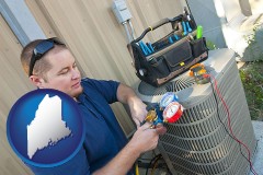 maine an HVAC contractor servicing an air conditioner