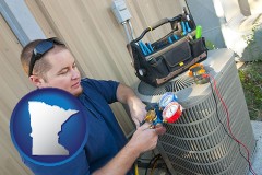 minnesota an HVAC contractor servicing an air conditioner