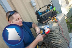 missouri an HVAC contractor servicing an air conditioner