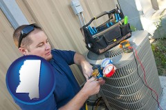 mississippi an HVAC contractor servicing an air conditioner