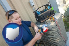 ohio an HVAC contractor servicing an air conditioner