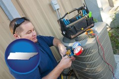 tennessee an HVAC contractor servicing an air conditioner