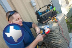texas an HVAC contractor servicing an air conditioner