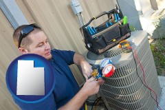 utah an HVAC contractor servicing an air conditioner