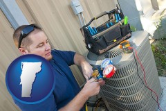 vermont an HVAC contractor servicing an air conditioner