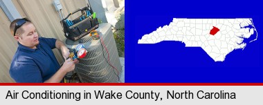 an HVAC contractor servicing an air conditioner; Wake County highlighted in red on a map