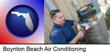 an HVAC contractor servicing an air conditioner in Boynton Beach, FL