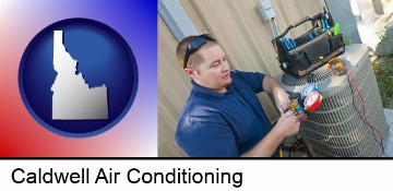 an HVAC contractor servicing an air conditioner in Caldwell, ID
