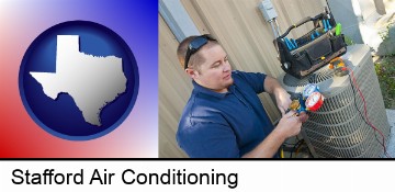 an HVAC contractor servicing an air conditioner in Stafford, TX
