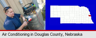 an HVAC contractor servicing an air conditioner; Douglas County highlighted in red on a map